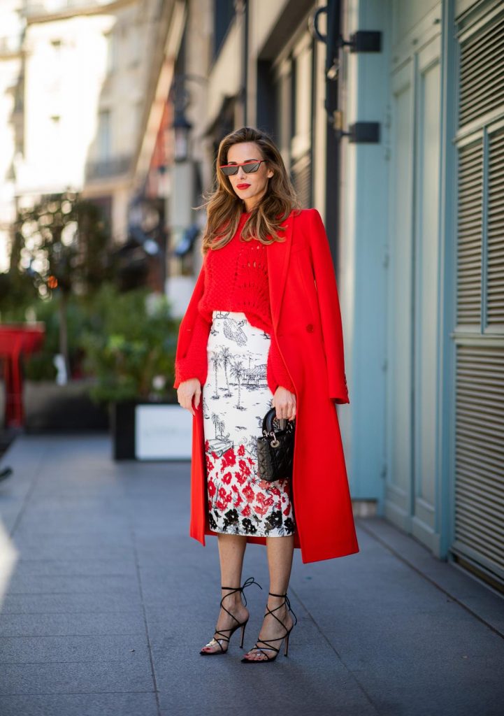 pfw_aw19_day2-91 (Copy)Alexandra Lapp in a Printed Skirt look, wearing a fitted two button coat in bright red from Givenchy, with a NO.21 sequined twill pencil skirt with a Palm-print, a red wool loose knit sweater from Ganni - all from Breuninger, black sandals from Gianvito Rossi, Prada cat-eye shaped sunglasses with red details and the Lady Dior mini bag during Paris Fashion Week Womenswear Fall/Winter 2019/2020 on February 26, 2019 in Paris, France. (Photo by Christian Vierig/Getty Images)